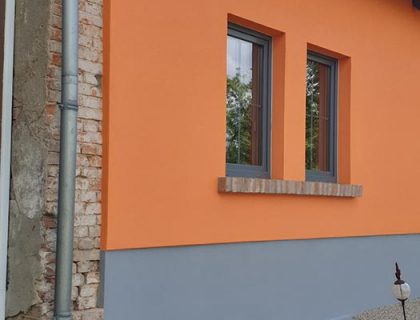Orange Grau Fassadengestaltung Putz Muehlenflies Treuenbrietzen Flaeming