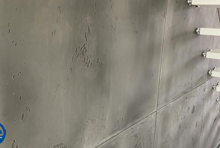 Treppenhaus / Kaminwand in Betonoptik vom Lieblingsmaler in